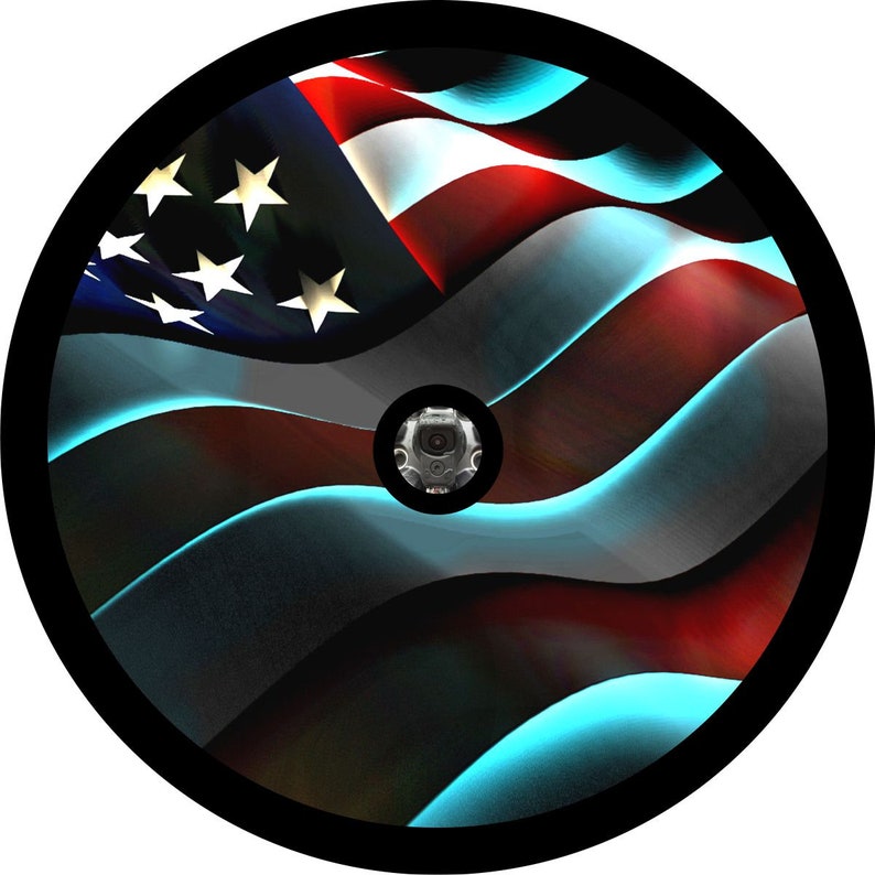 Flowy and waving American flag in red, white, and blue spare tire cover mock up on black vinyl with a hole to accomodate a backup camera.