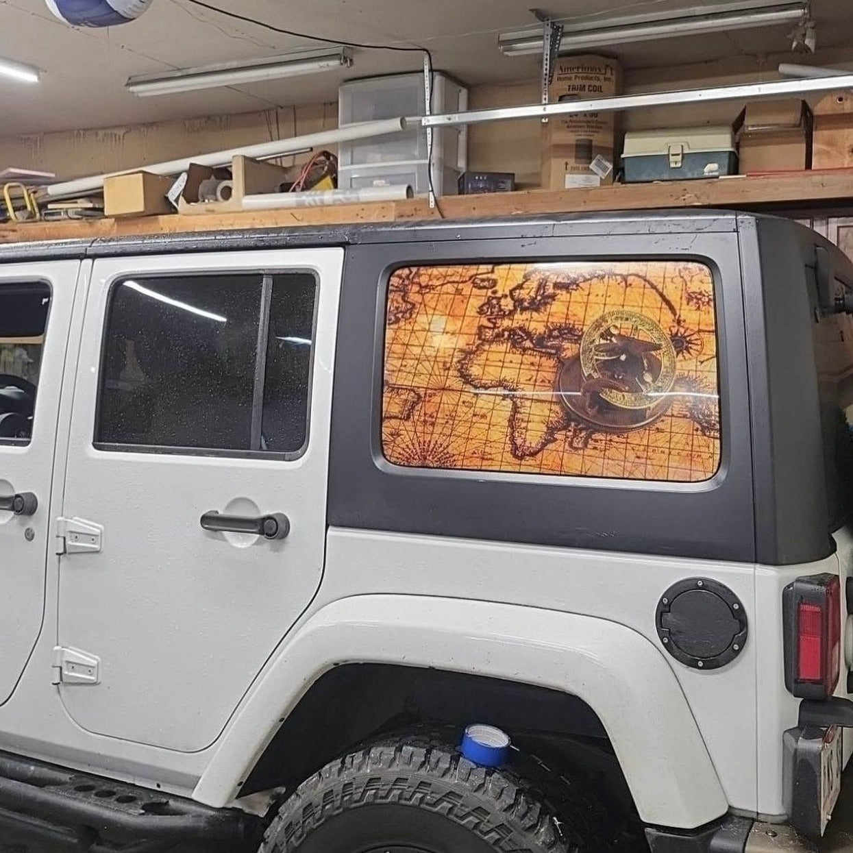 Antique global map design with compass creative and unique window cling decal for a Jeep Wrangler.