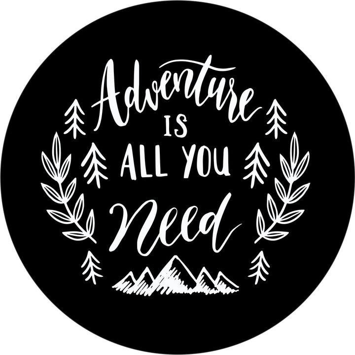 Black vinyl spare tire cover design mockup with the text that says Adventure Is All You Need and some cute graphics of leaves and mountains