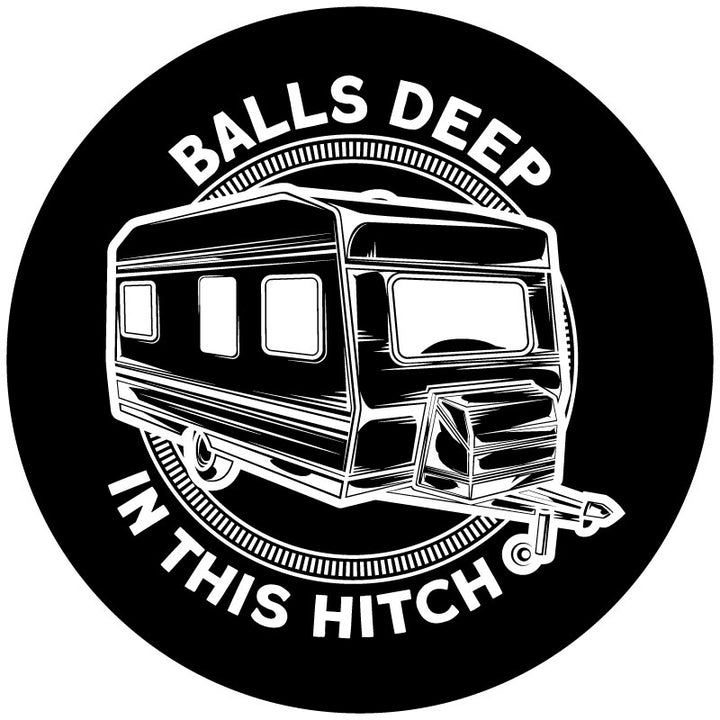 Mockup example of an RV spare tire cover design that has a travel trailer camper graphic in the center and a funny play on words with the says "balls deep in this hitch" curved on the out top and bottom.