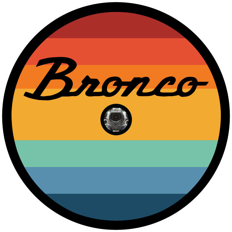 Multicolored vintage stripes Ford Bronco spare tire cover with backup camera hole. 