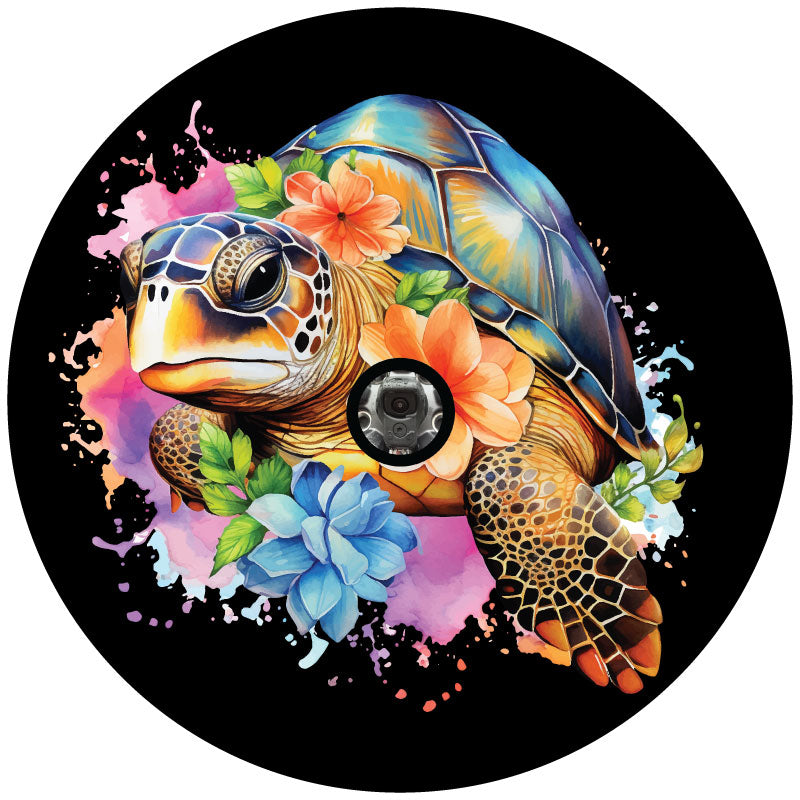 Mock up design for a spare tire cover with a back up camera of a sea turtle in watercolors popping out of the cover with multicolor flowers.