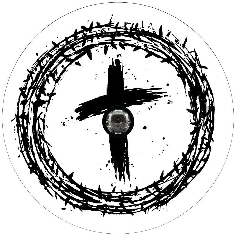 Mockup example of a white vinyl spare tire cover with a Jesus crown of thorns on the outside and a paint brushed cross with backup camera hole