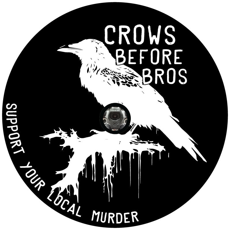 A mock design for a spare tire cover of a crow silhouette and a saying that says crows before bros, support your local murder for any kind of Jeep, Bronco, RV, Camper, Motorcoach or any other spare tire cover for any vehicle with a backup camera in the spare wheel. 