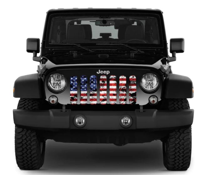 Black Jeep Wrangler displaying a Jeep grille insert of an American flag in full color red white and blue with rustic dirty detail