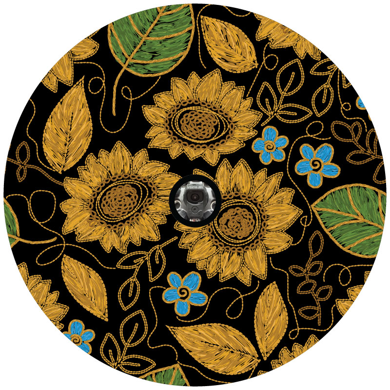 Mockup example of a cute spare tire cover design of florals and sunflowers to look embroidered. Colorful flowers on a black vinyl spare tire cover with a center hole to fit a spare wheel with a backup camera.