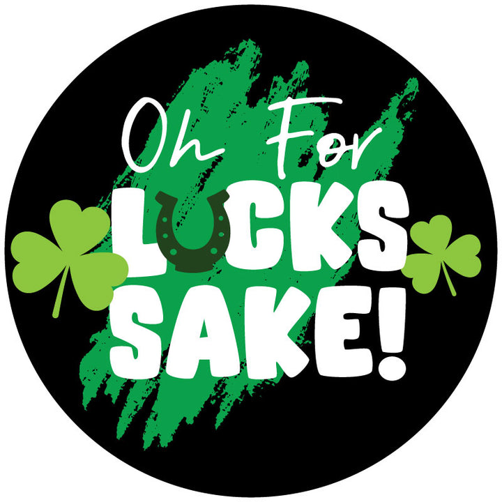 A mockup example design for a black vinyl spare tire cover with the saying :oh for lucks sake" and a green horseshoe upside down for the U in luck, plus green paint swatch and some green clovers or spades.