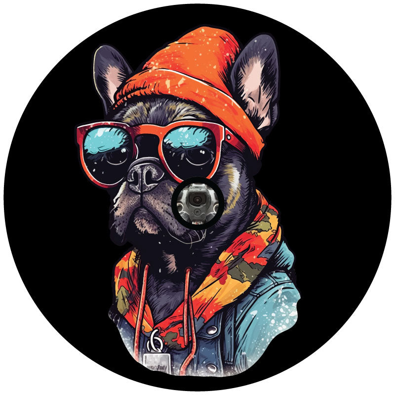 Mockup view of a spare tire cover design of a french bulldog wearing street clothes and sunglasses with a hole for a backup camera.
