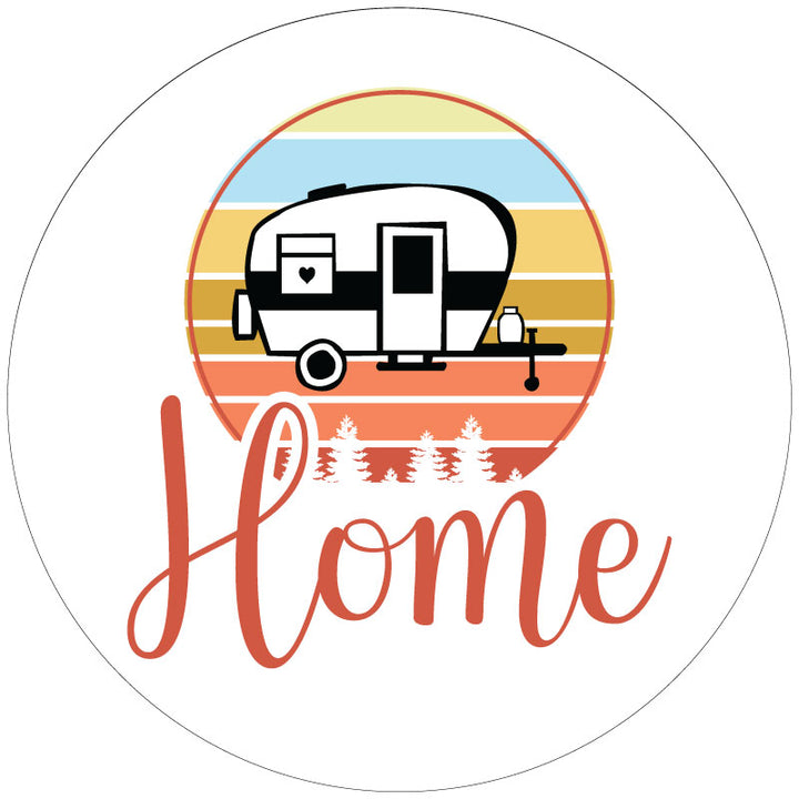 White vinyl spare tire cover for RVs and campers with the image of a small camper graphic and the word Home written in a creative font embedded into the design.