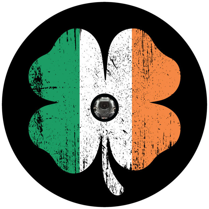 Rustic Irish flag color design inside a shamrock four-leaf clover spare tire cover design with a hole in the center for a backup camera