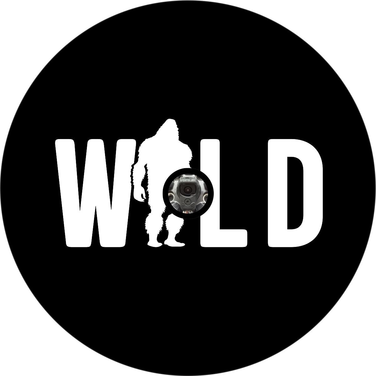 Black vinyl spare tire cover with white letters that say WILD, but with a silhouette of sasquatch replacing the I & a hole for a back up camera design in the spare wheel.