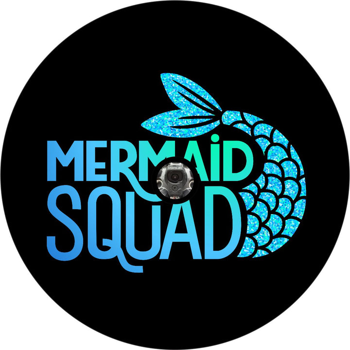 Blue and turquoise sparkle mermaid tail with the text mermaid squad spare tire cover on a black vinyl cover plus a hole for a back up camera.