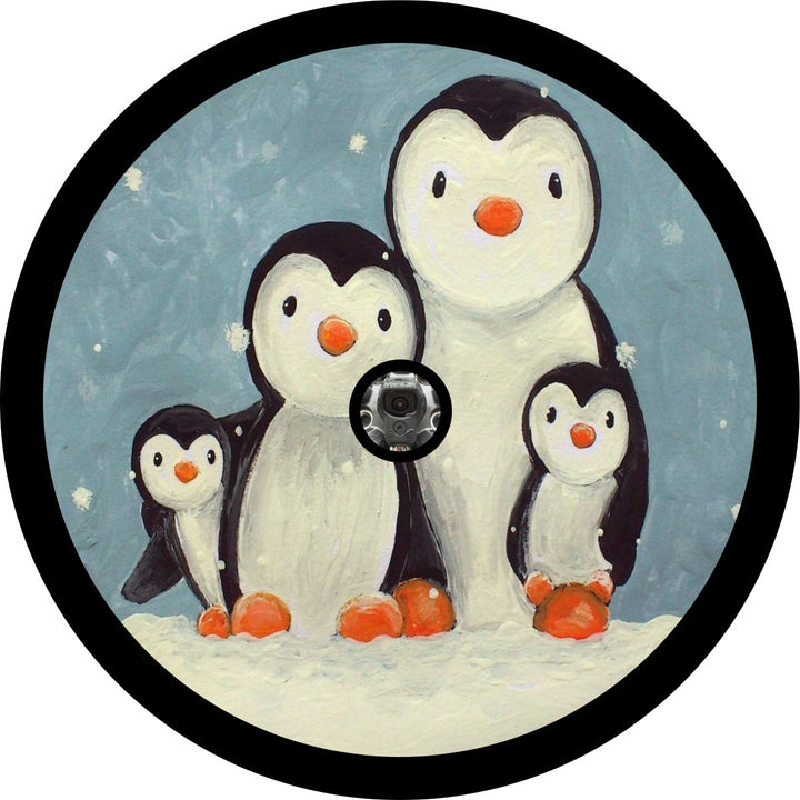 Spare tire cover design mockup of a cute penguin family of four on a black vinyl soft spare tire cover for backup camera