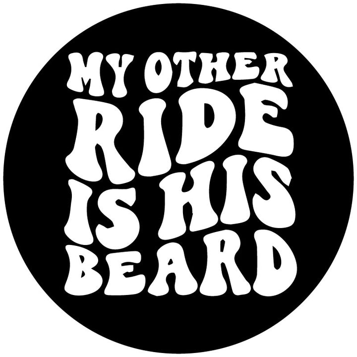 Black circle spare tire cover mock up with funky retro lettering that reads, my other ride is his beard. Funny spare tire cover design.