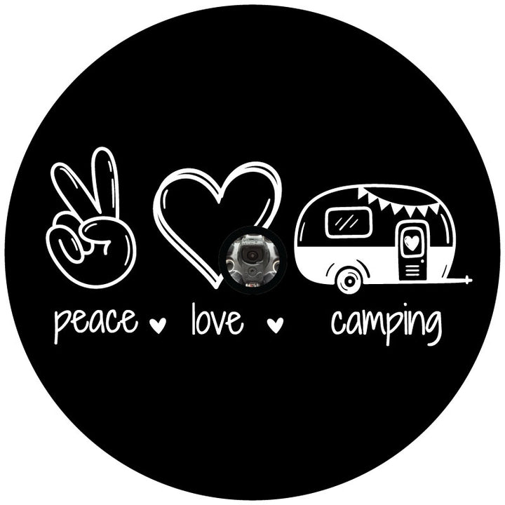 Spare tire cover for campers that says peace, love, camping with a hand peace sign icon, heart, and a cute hand drawn RV camper with a center hole to accommodate a backup camera.