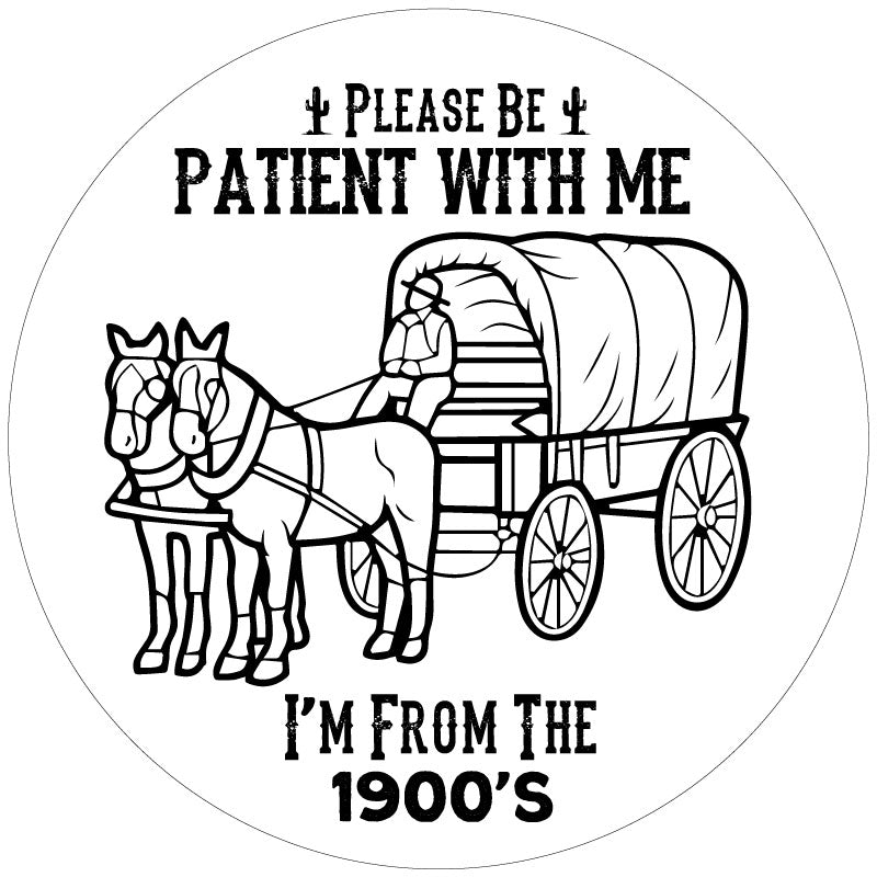 A spare tire cover design that says please be patient with me I'm from the 1900's and a silhouette of a covered wagon and horses