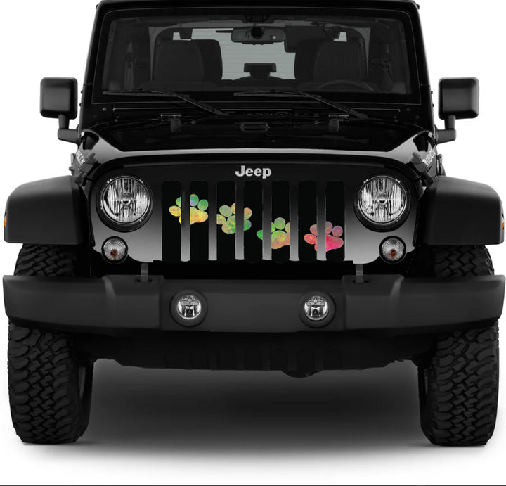 Black Jeep Wrangler displaying a black Jeep grille insert with 4 diagonal puppy paw prints across the front