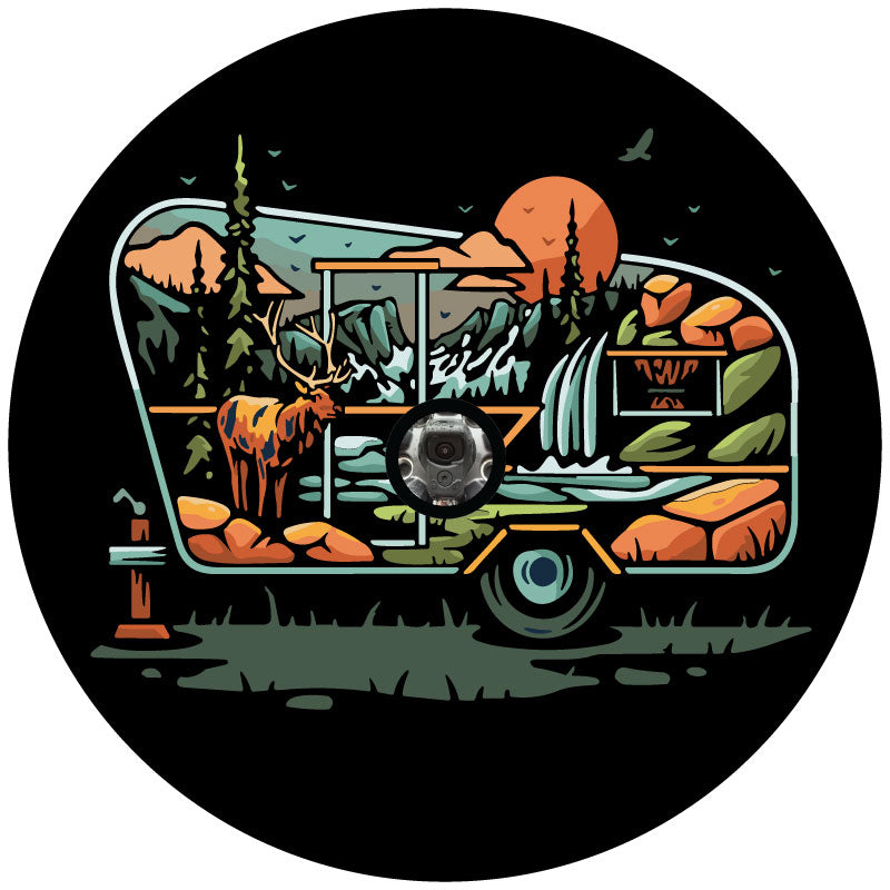 A creative and unique spare tire cover design of an RV or camper outline and a nature scenic landscape of an elk, waterfall, mountains, and more designed inside the camper outline plus a hole in the center for a backup camera