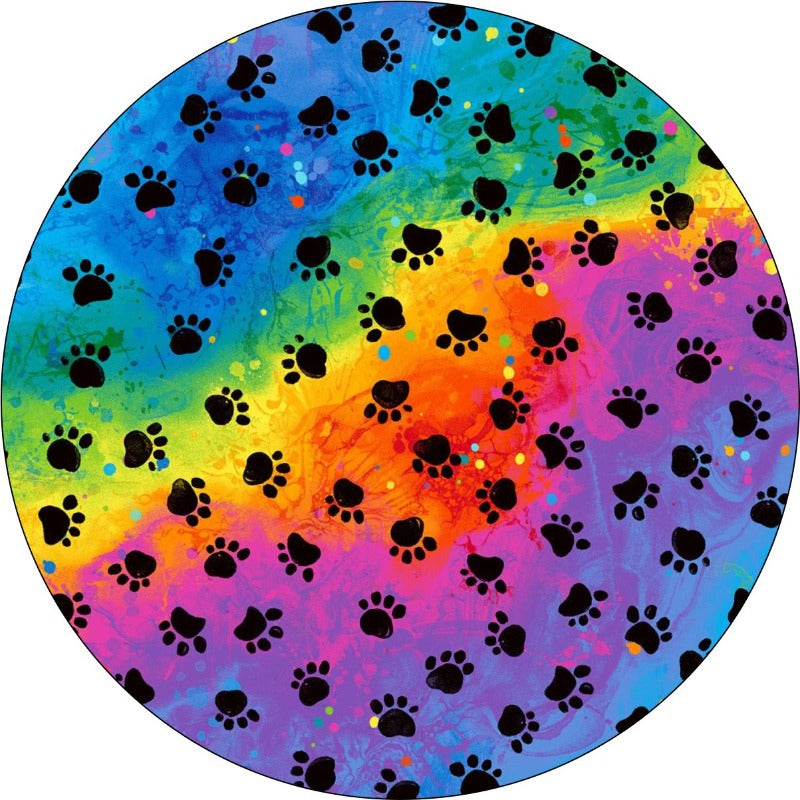 Bright and beautiful rainbow colored painted design with blue, pink, green, yellow, orange, red, and purple colors behind dog paw pattern spare tire cover design for any vehicle with a spare wheel in need of covering.