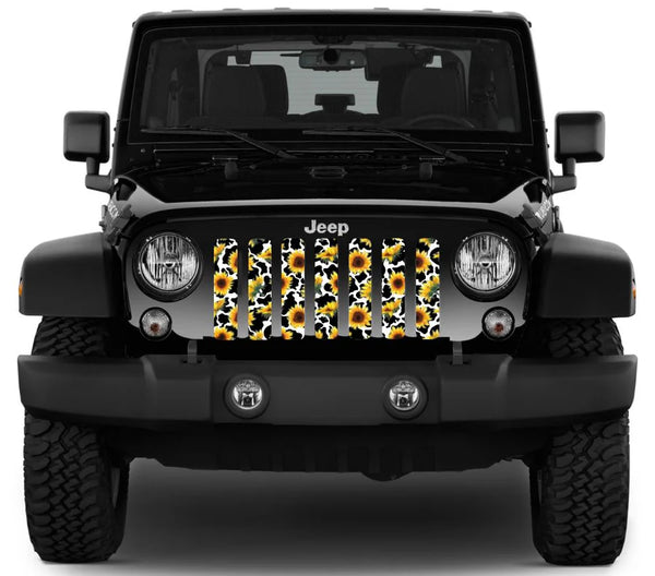 Sunflower and cow print patterned Jeep grille insert design on a black Jeep Wrangler