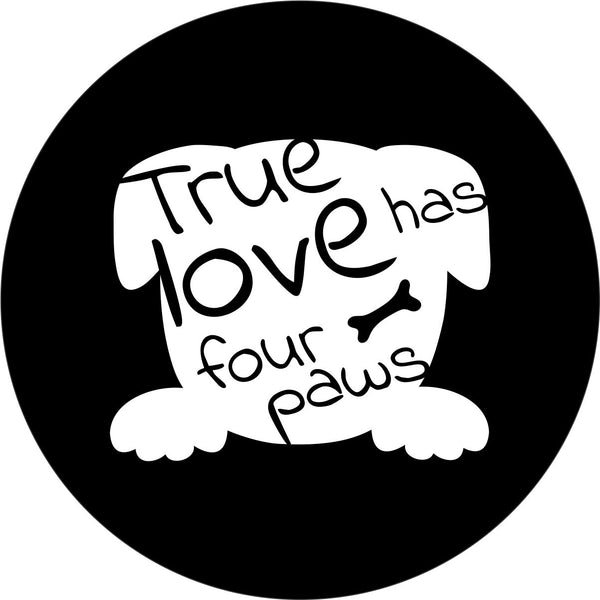 White silhouette of a dog head and paws with the text true love has four paws written within it as a spare tire cover design on black vinyl