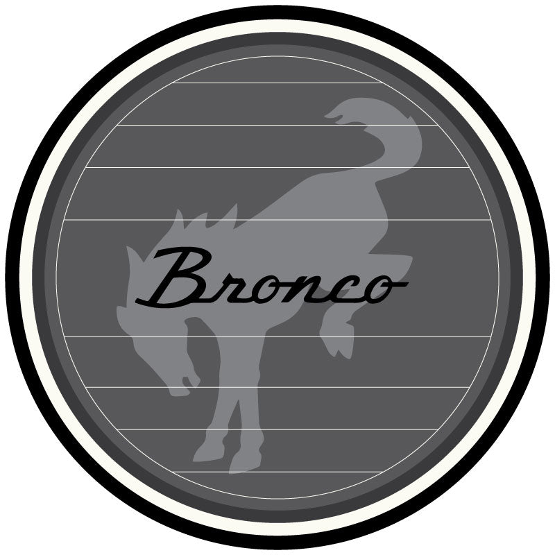 Gray, black, and white vintage Ford Bronco spare tire cover design with Bronco watermark and the Bronco vintage logo