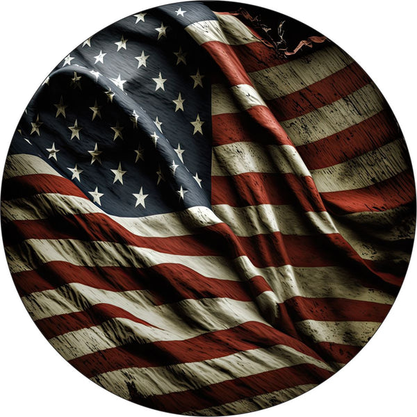 Red, white, and blue distressed and tattered wavy American flag designed spare tire cover for a Jeep, Bronco, FJ Cruiser, van, RV, camper, trailer, or any other vehicle with a spare wheel in need of covering.
