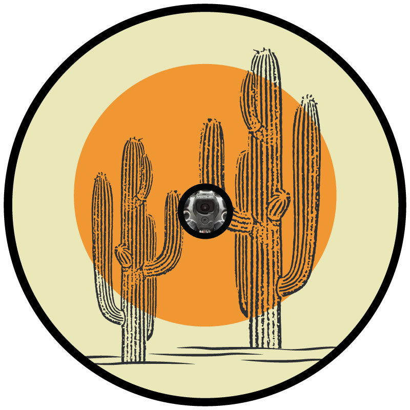 Two hand drawn cactus graphic designs with a big orange circle sun backdrop as a spare tire cover for RV, camper, Jeep, Bronco, or any other vehicle that needs to cover an external spare wheel that has a backup camera in the center