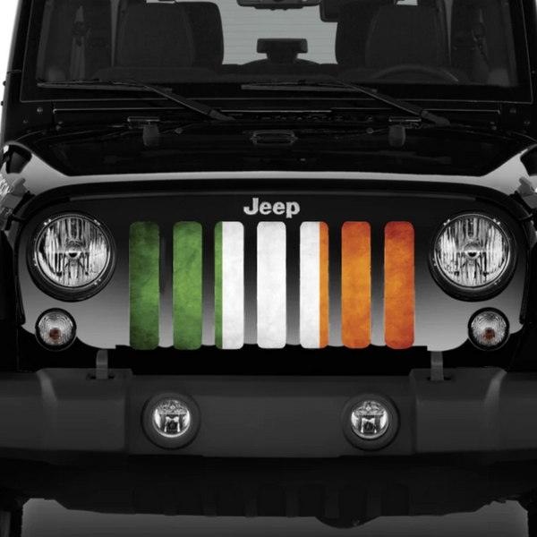 Irish flag design on a Jeep grille insert displaying on a black Jeep Wrangler.