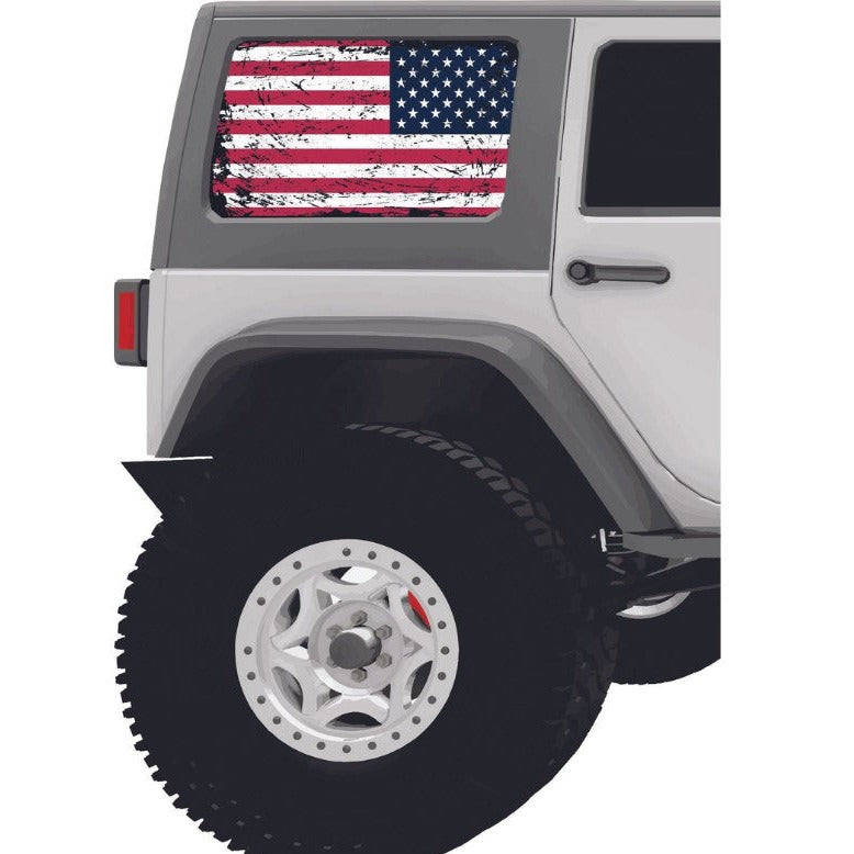 Rustic American flag window decal sticker on a white Jeep Wrangler's back window.