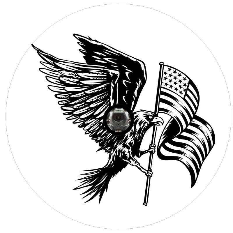A spare tire cover design for a Jeep, Bronco, RV, Camper, Trailer, and more with an American eagle flying with the American flag in its claws. Designed for white vinyl tire cover with a back up camera