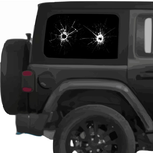 Window decal stickers of realistic bullet holes shot through the back windows on a Jeep Wrangler.