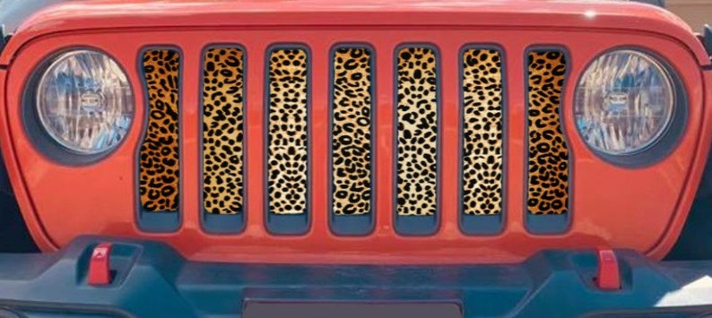 Cheetah print mesh grille insert for Jeep on Red Jeep