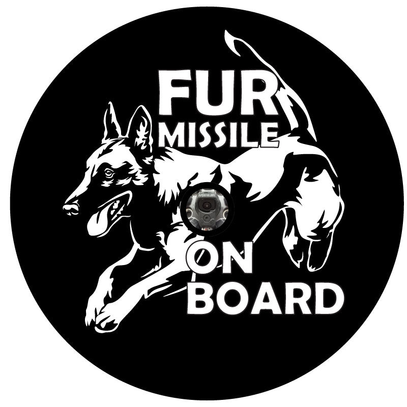 Fur missile on board belgian malinois jumping spare tire cover design for a black vinyl tire cover for Jeep, Bronco, RV, camper, and more designed with back up camera