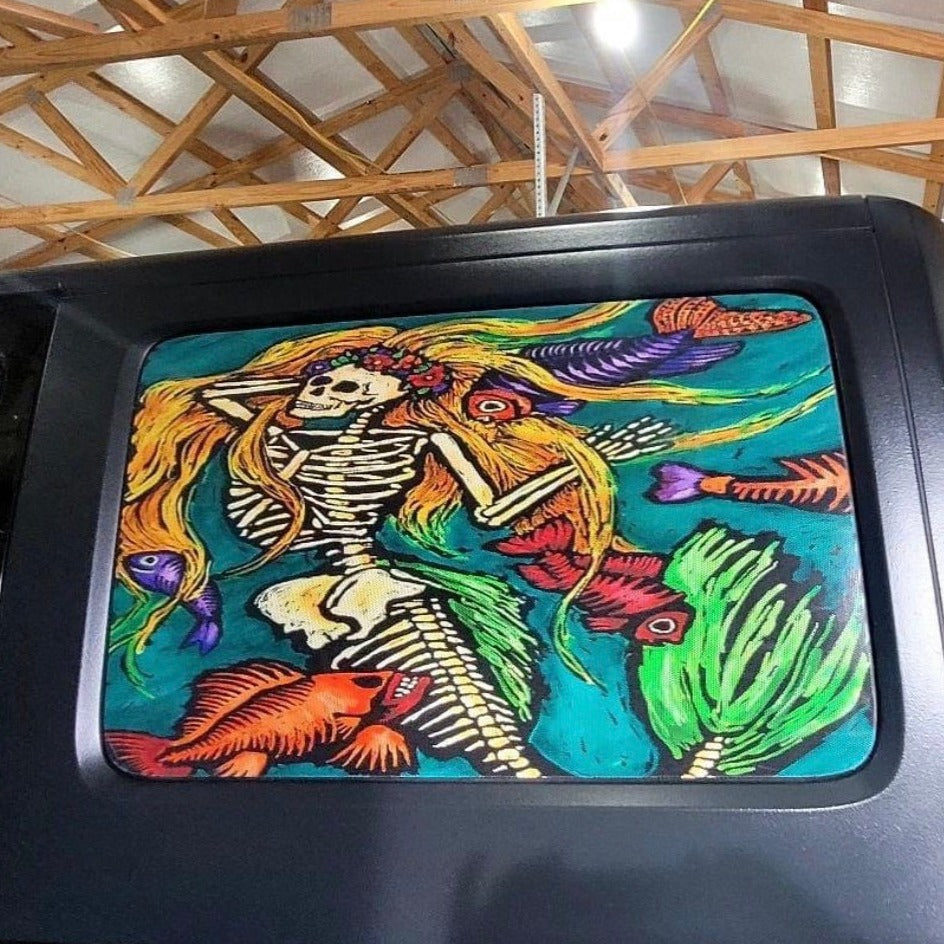 Mermaid skeleton painted design Jeep Wrangler window decal. 