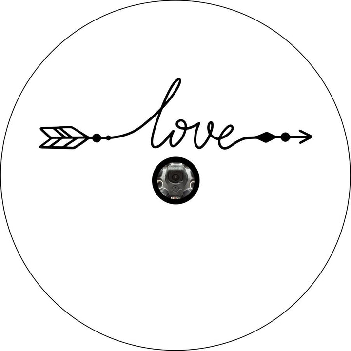 A simple spare tire cover design on white vinyl with a back up camera design of the word love in a cursive font that with the beginning and end intended to look like an arrow. 