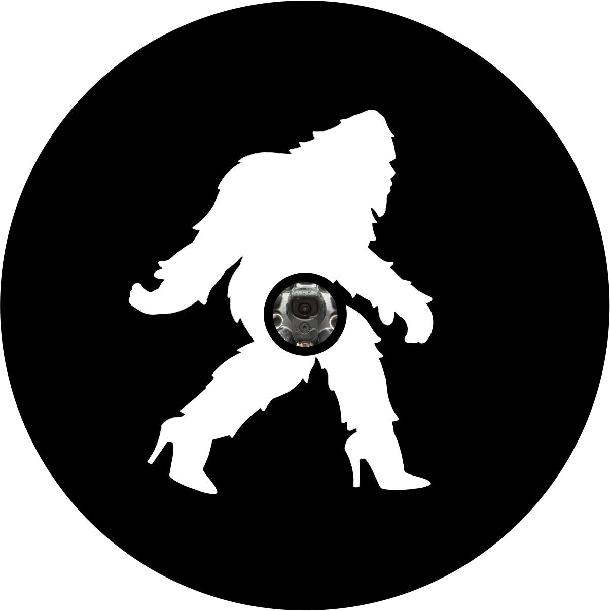 Black Vinyl Spare Tire Cover With A Silhouette Of A Bigfoot Shesquatch in high heels Walking Across The Center plus a camera hole space for a back up camera
