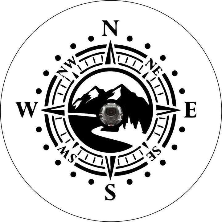 Mock up spare tire cover design for spare wheels with a back up camera. Design is a mountain road with a compass.