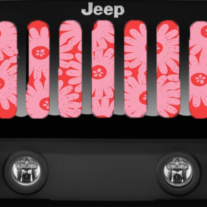 Close up look at the pink flowers on a Jeep grille insert