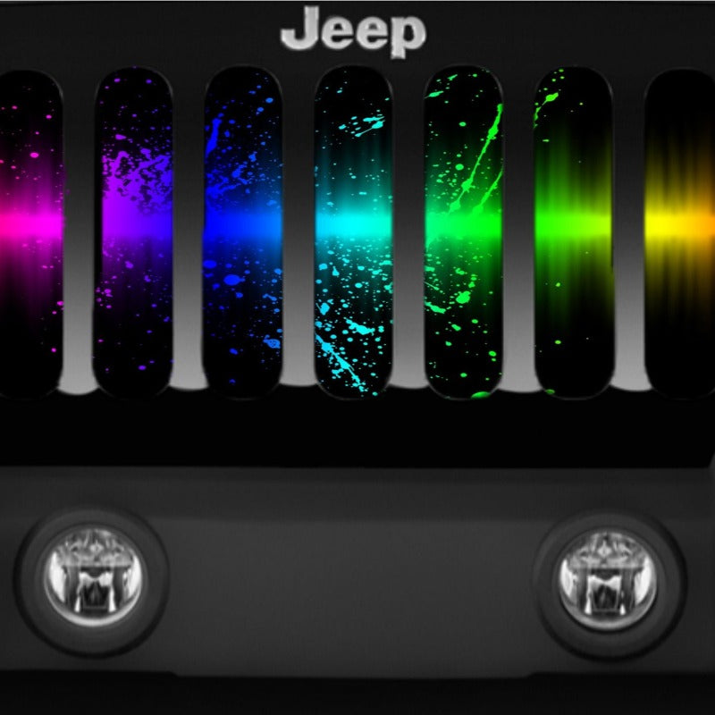 Close up look at the design of a rainbow splash of paint creative designed Jeep wrangler grille insert.