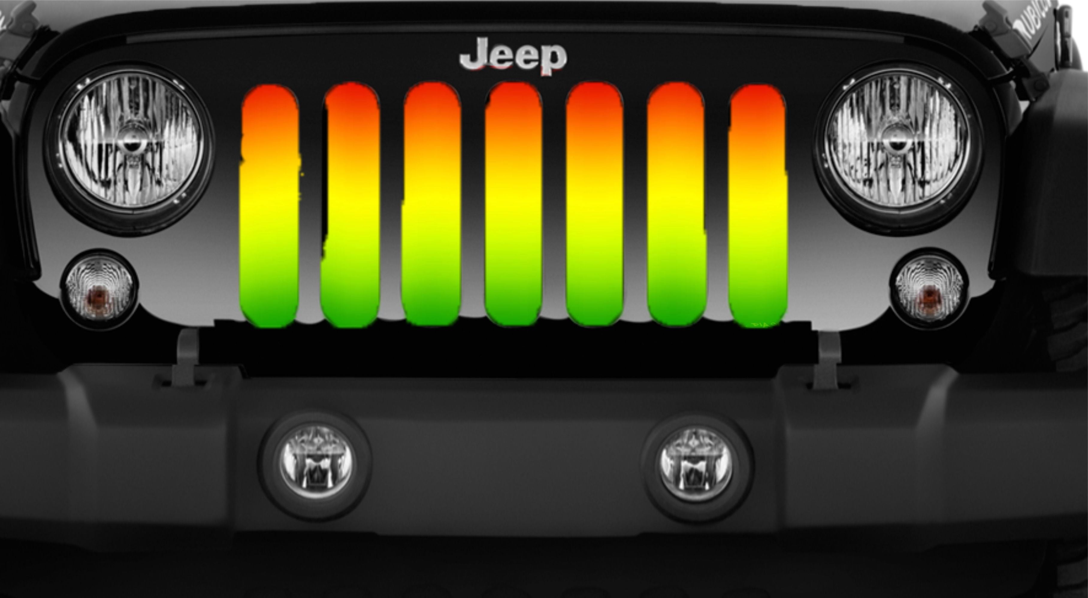 A close up look of a black Jeep showcasing The symbolic Rastafarian colors blend together in an ombre style to create this custom made grille insert for Jeep. 