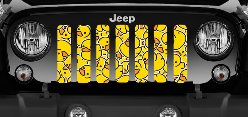 Close up view of Black Jeep Wrangler showcasing Rubber Duck Pattern Design Jeep Grille Insert