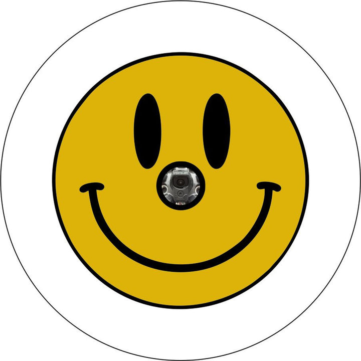 White vinyl spare tire cover with a basic yellow smiley face and a back up camera design.