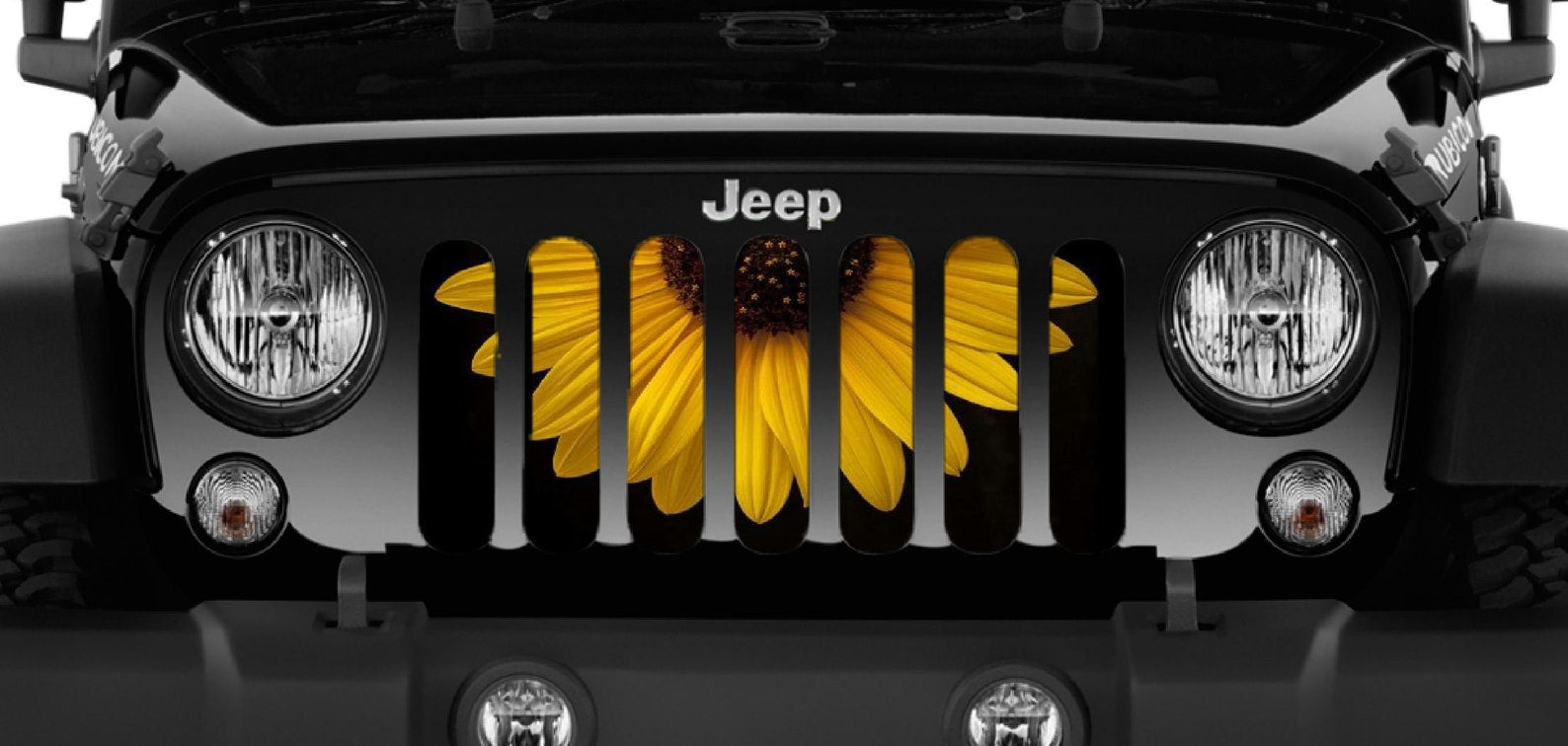 Close Up view of Half of a Sunflower design being showcased on a black Jeep Wrangler