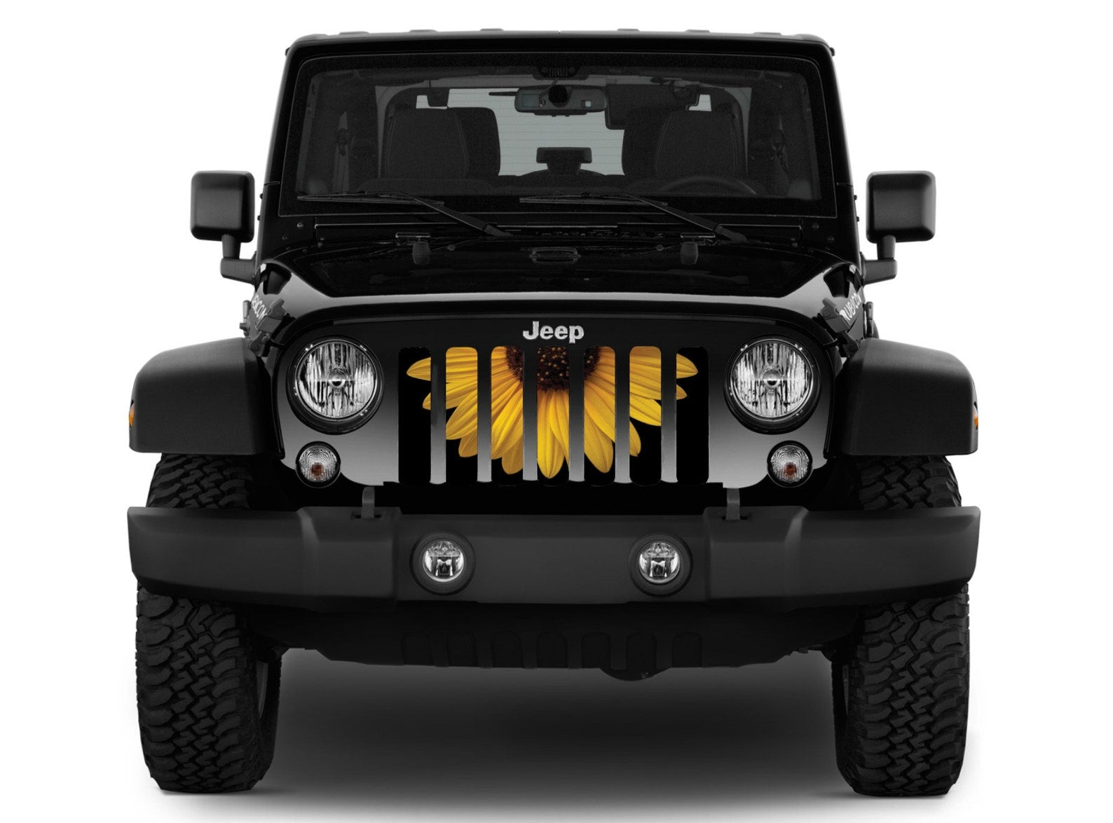 Half of a Sunflower design being showcased on a black Jeep Wrangler