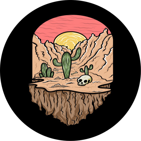 Death Valley creative spare tire cover design. Rocky valley with cactus, skull, and the sun setting creative spare tire cover design.