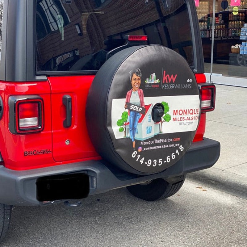 Custom spare tire cover of a real estate agent promoting their real estate business on their Jeep spare tire
