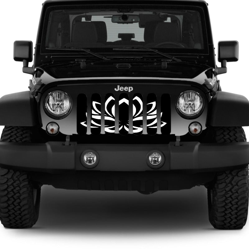 Lotus flower image insert design for a Jeep grille. Custom Jeep grille insert lotus flower prototype on a black Jeep wrangler